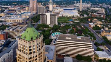 USA flag over Downtown, San Antonio, Texas, United States of America.
