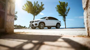 a white car parked on a road