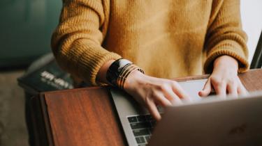person using laptop computer